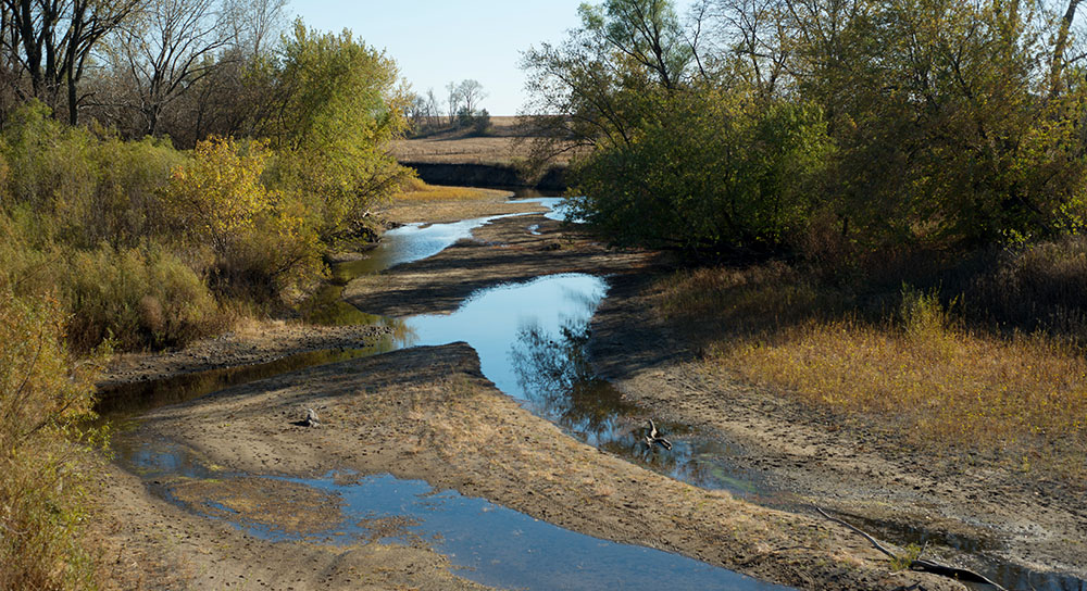 A stream runs dry because of drought conditions.