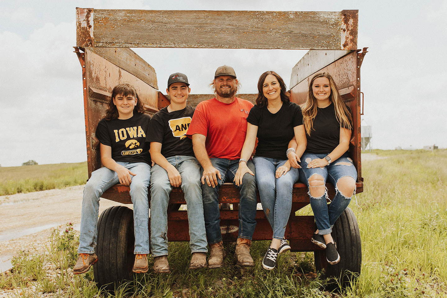 Iowa soybean grower on his farm with his family