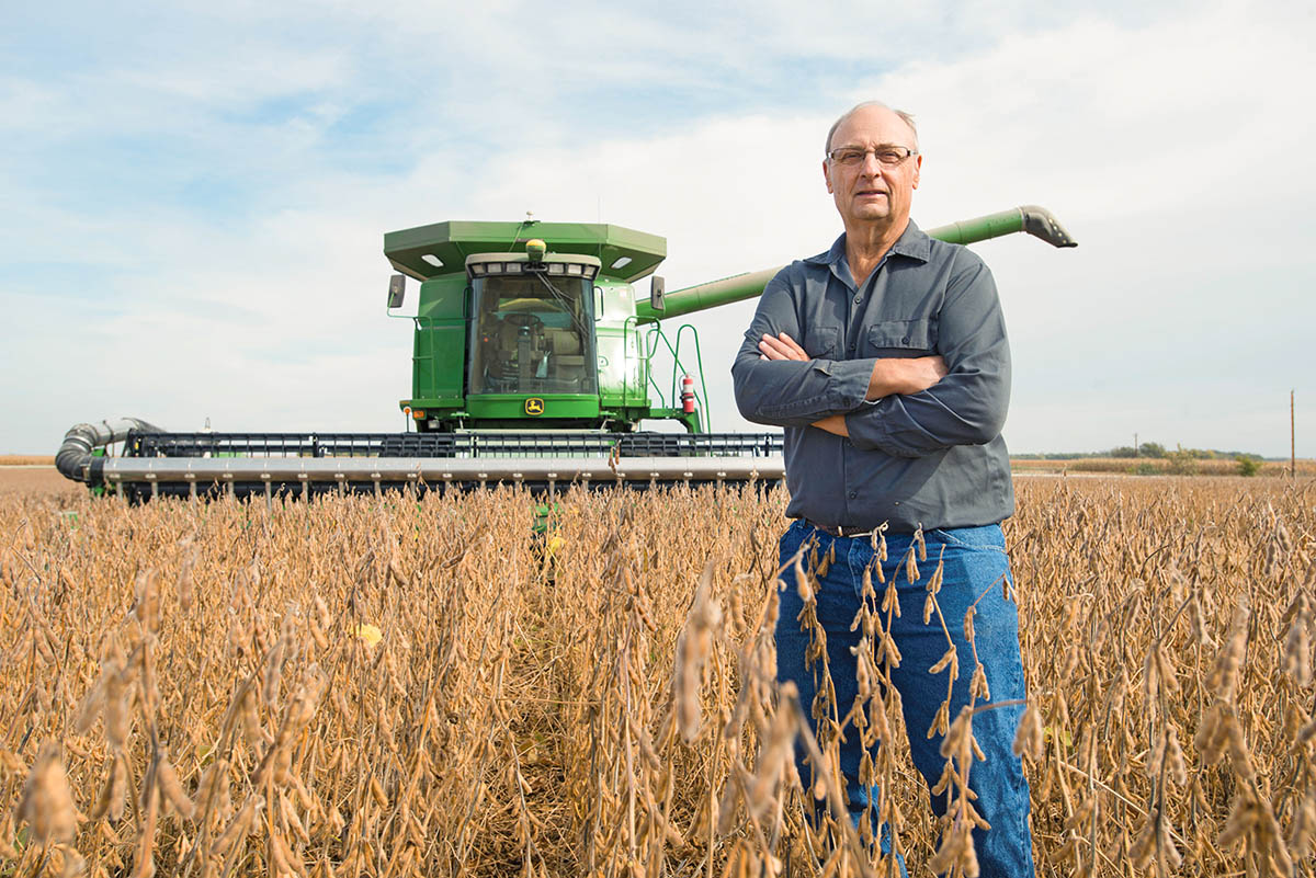 Iowa soybean farmer in field