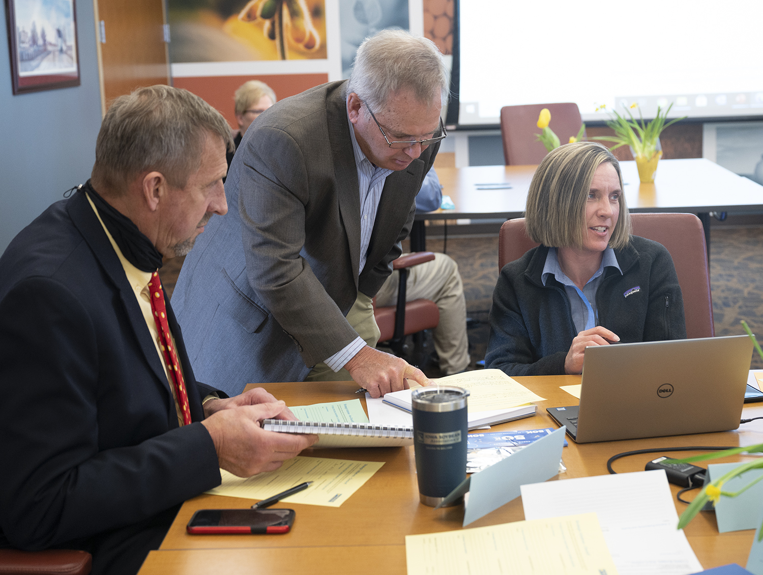 ISA directors collaborate around a table