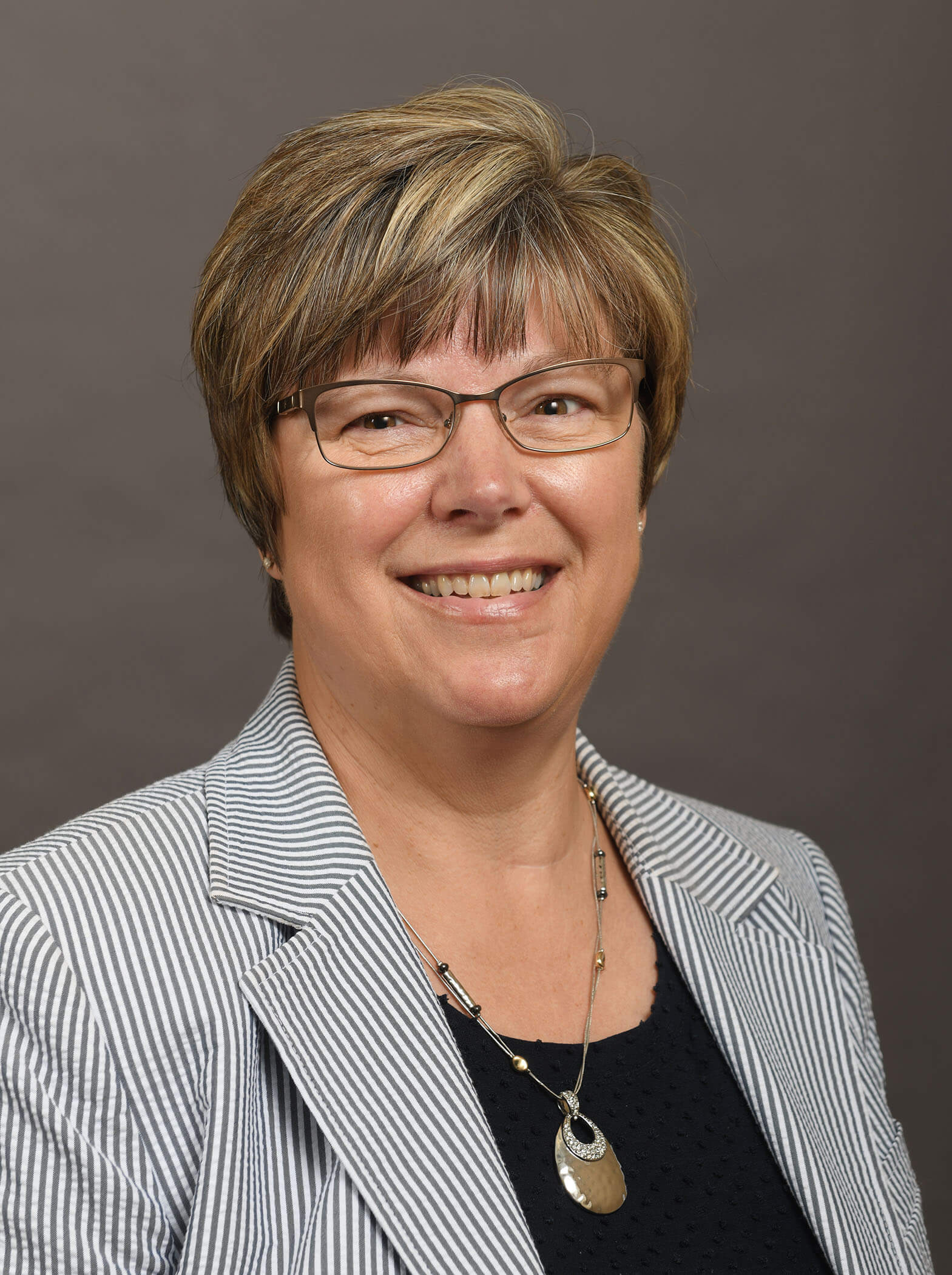 A headshot of Pat Swanson