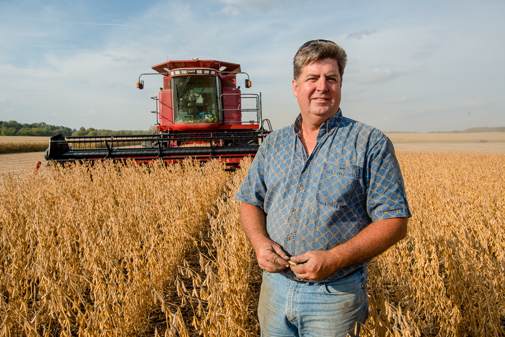 Dave Walton next to his combine in his field during har