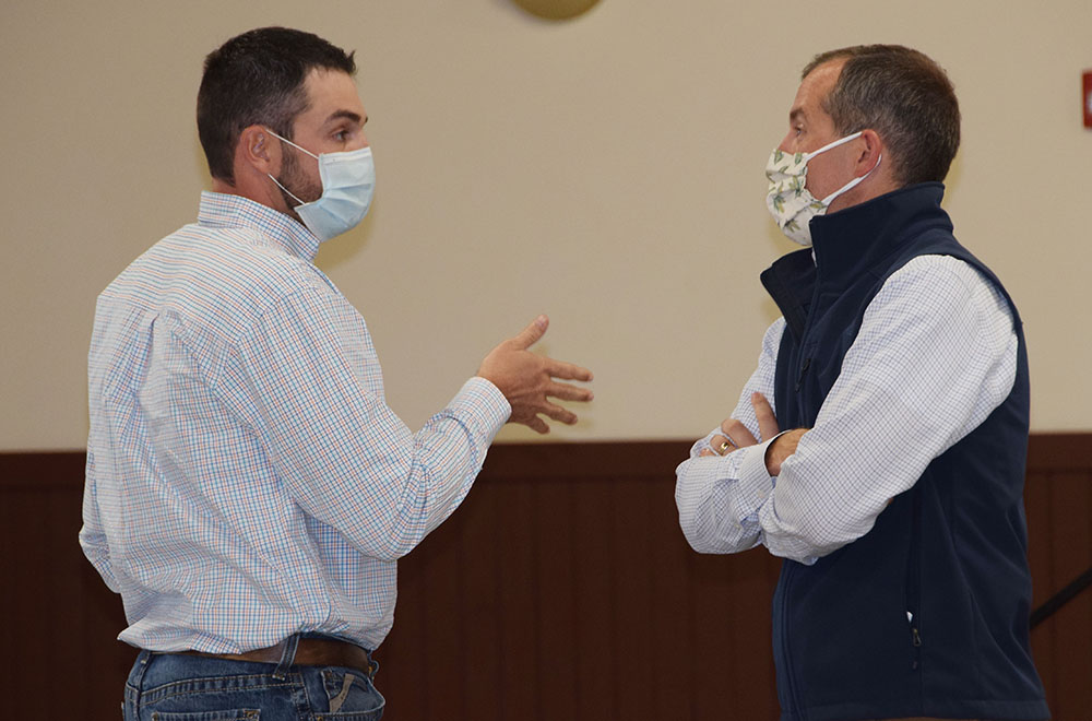 Josh Henik and Iowa Secretary of Agriculture Mike Naig 