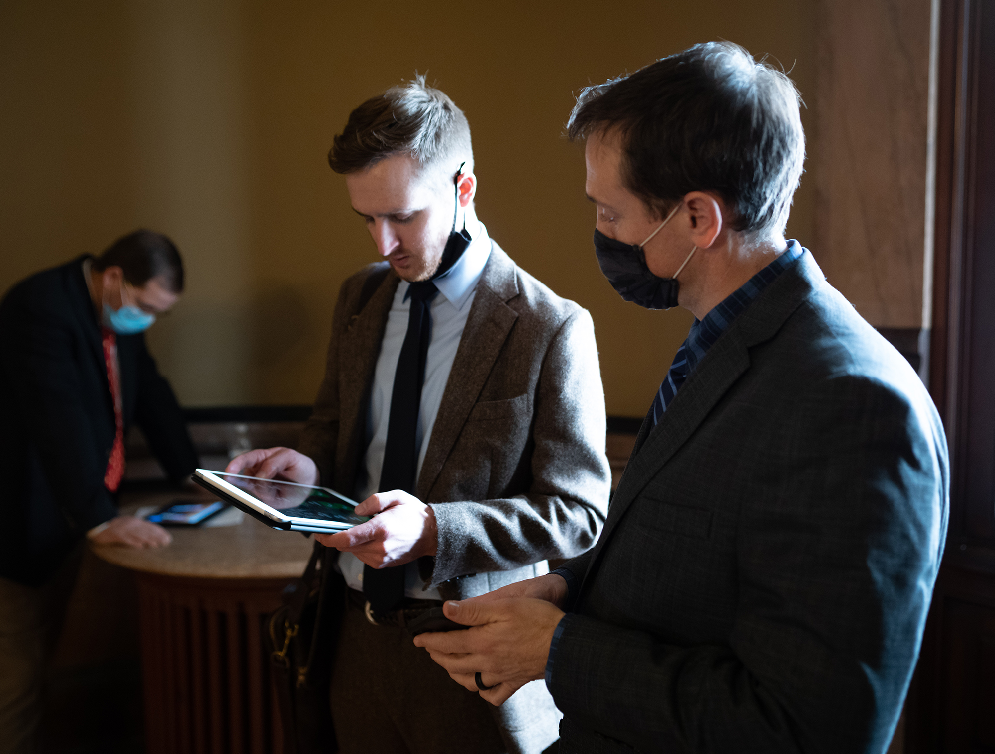 Michael Dolch and Grant Kimberley read through a propos