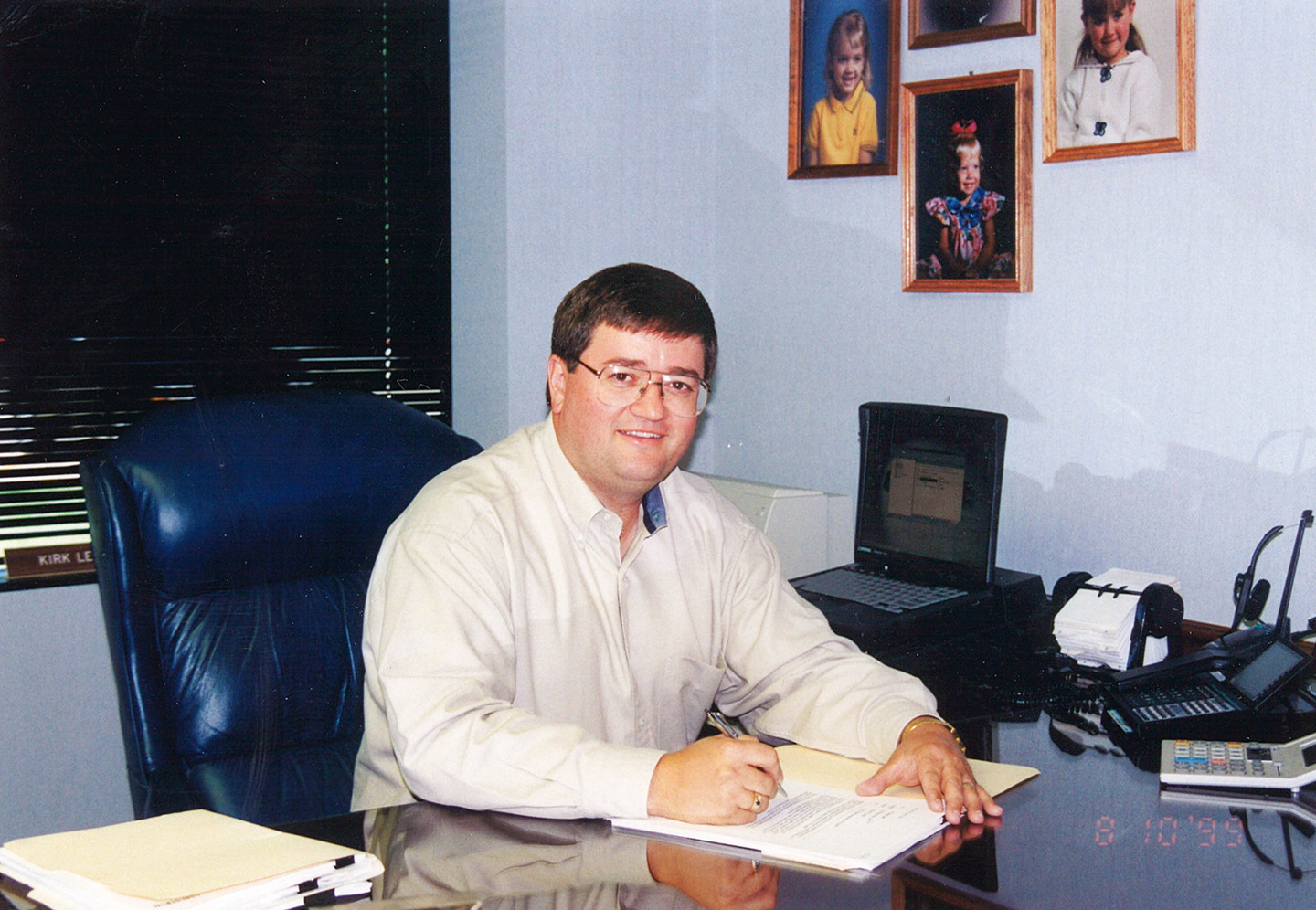 Kirk Leeds at desk in 1999