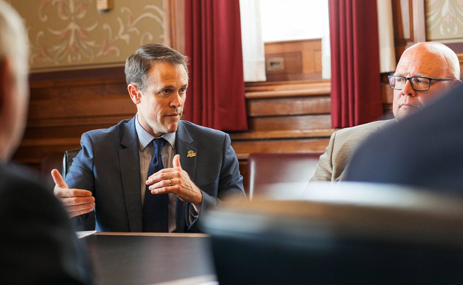 Grant Kimberley speaking with legislators