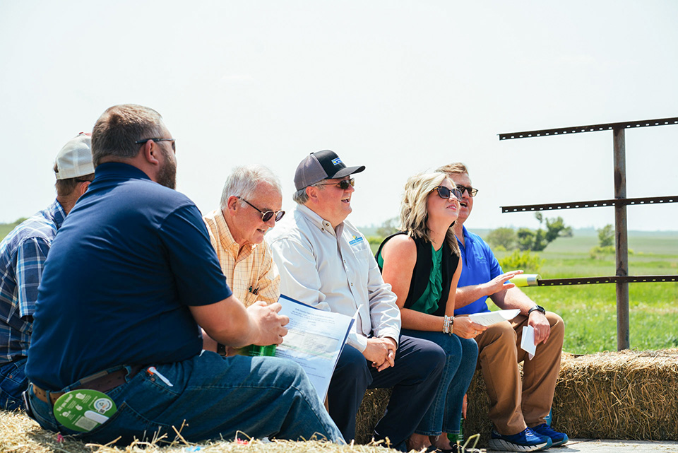 Iowa Agriculture Water Alliance Event Soybean Stakeholders Sitting on Hayrack