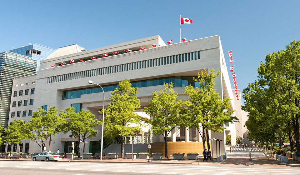 Canadian flags hanging on building