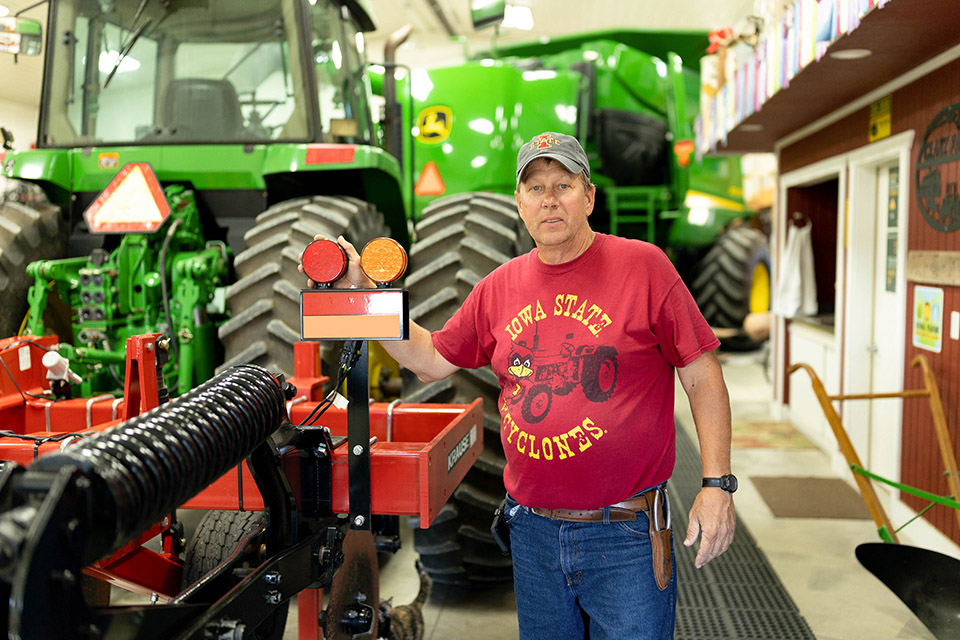 Farmer standing in workshop