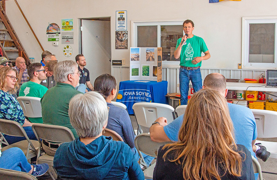 Evan Brehm speaking to group in workshop