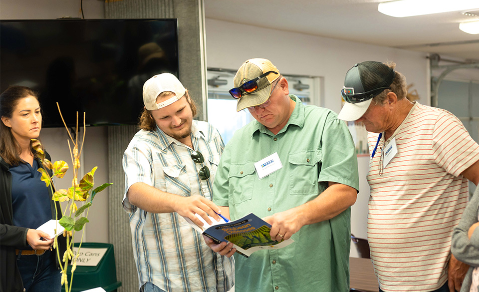 Iowa soybean farmers learning about research