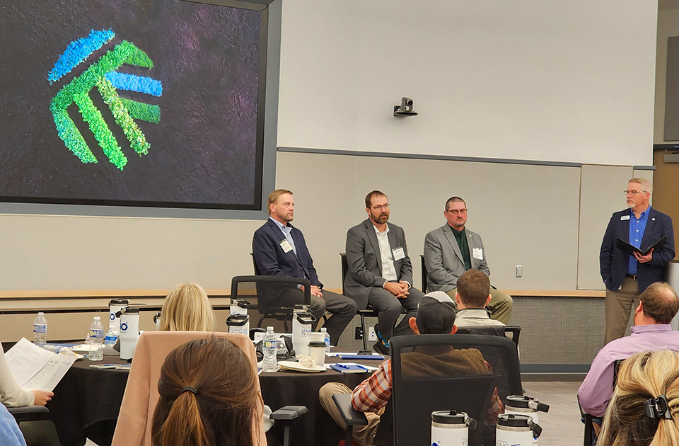 Iowa soybean farmers speaking at leadership event