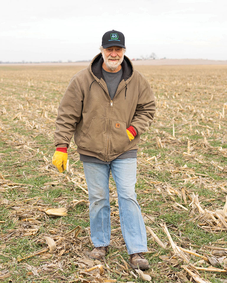 Farmer walking in field