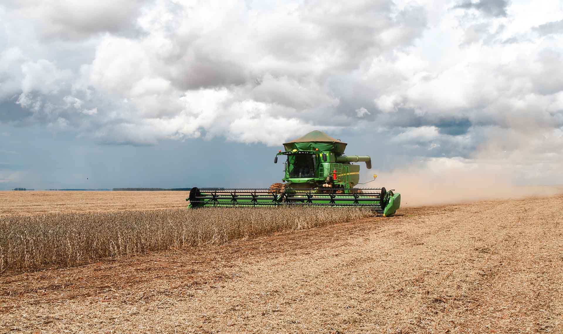 John Deere combine in Brazil harvesting soybeans