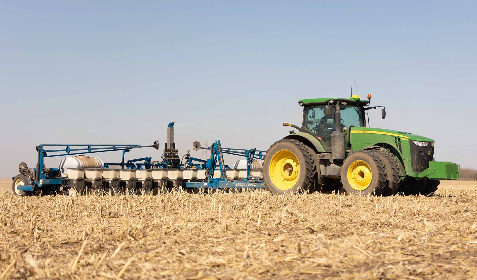 Kinze Planter on John Deere Tractor