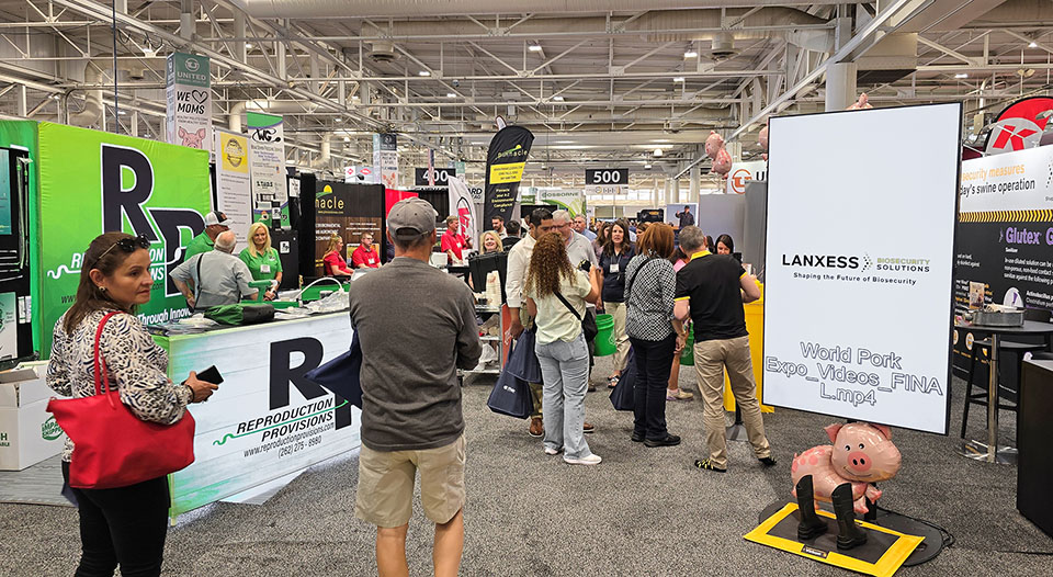 Attendees visit pork event in Des Moines