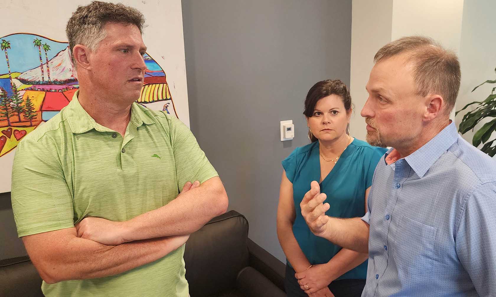 Soybean farmer and CARB stakeholder having a conversati