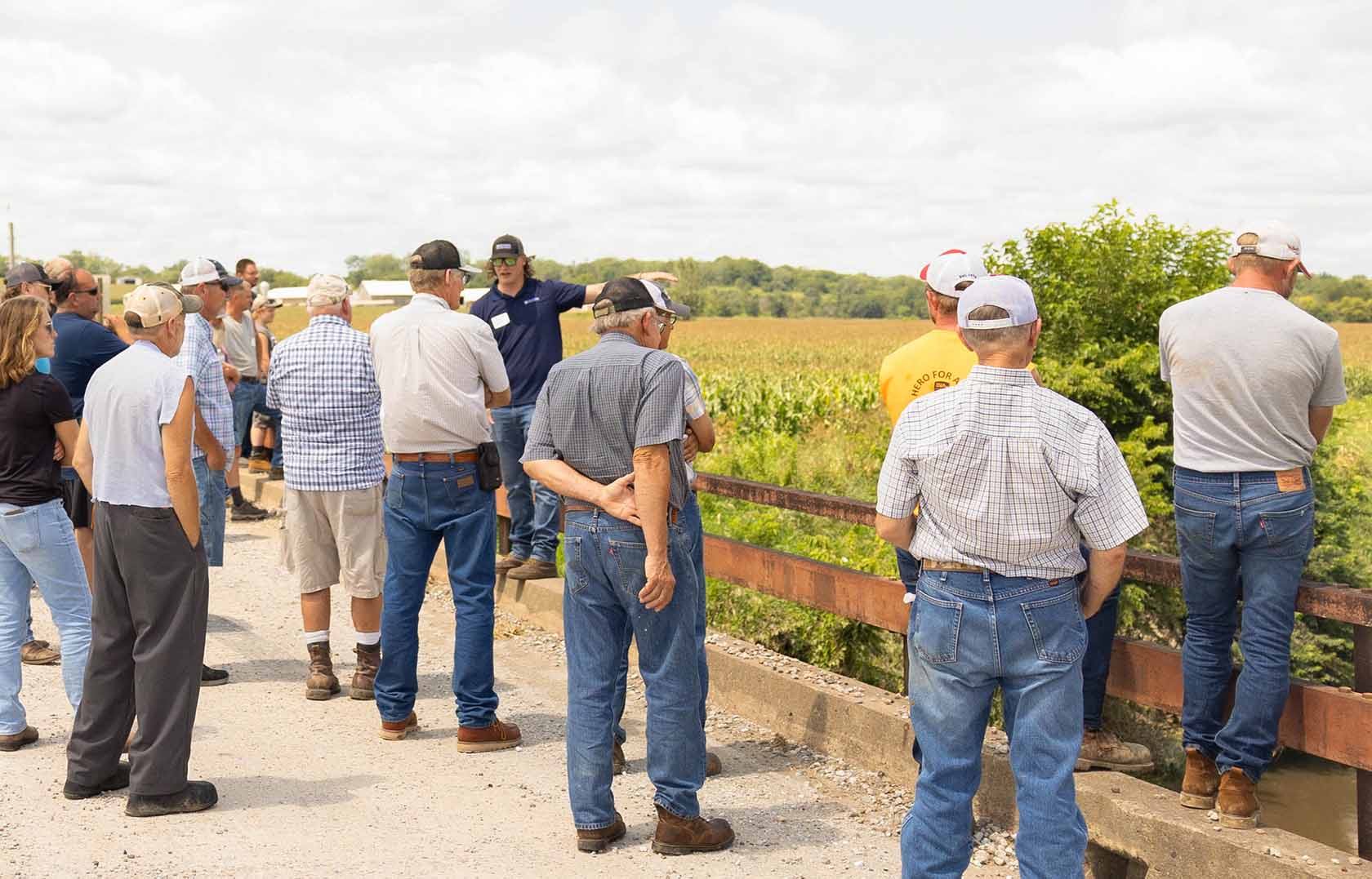 Farmers listening to Brandon Iddings at field day