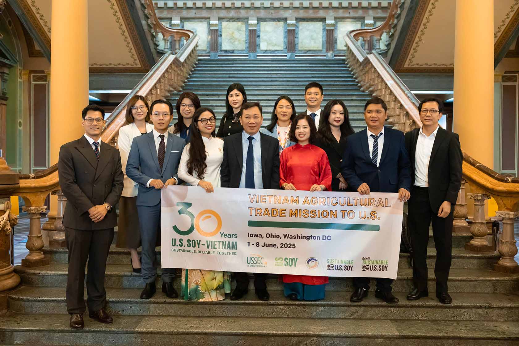 Vietnam Trade Delegation Vietnamese holding banner from trade trip