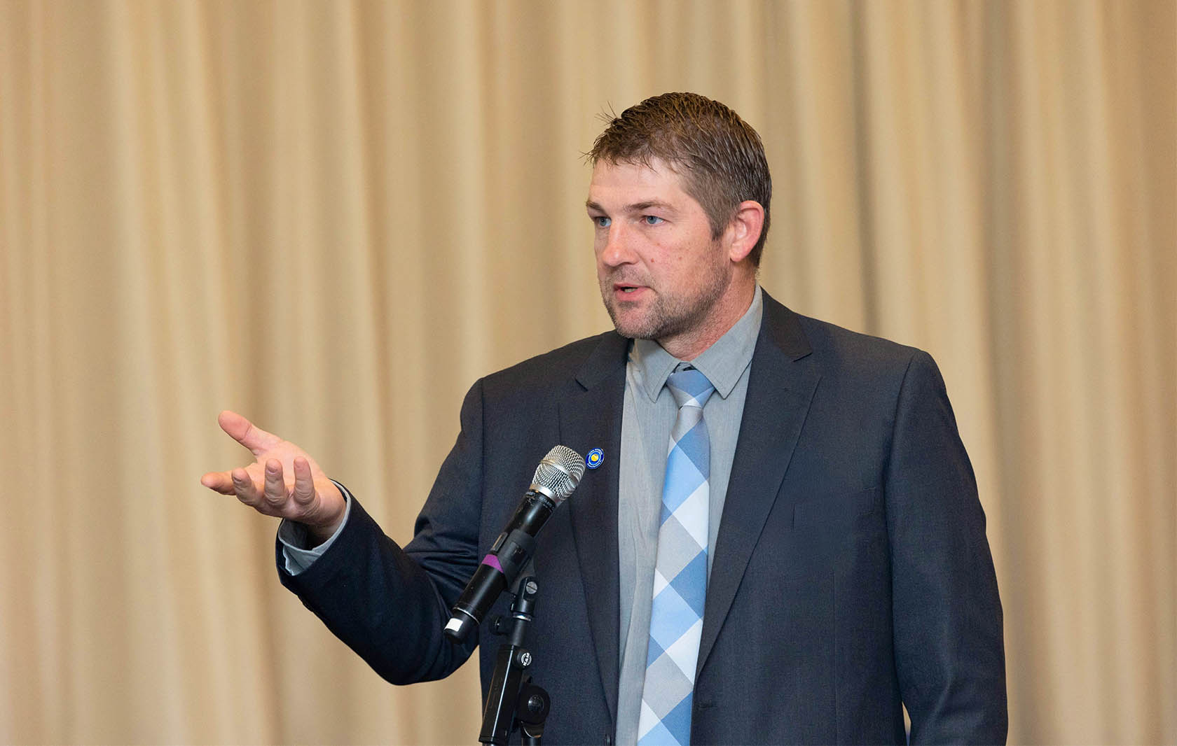 Iowa soybean farmer in a suit