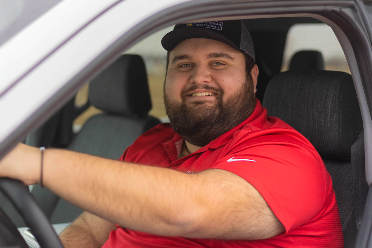 Conservation Program Coordinator driving truck