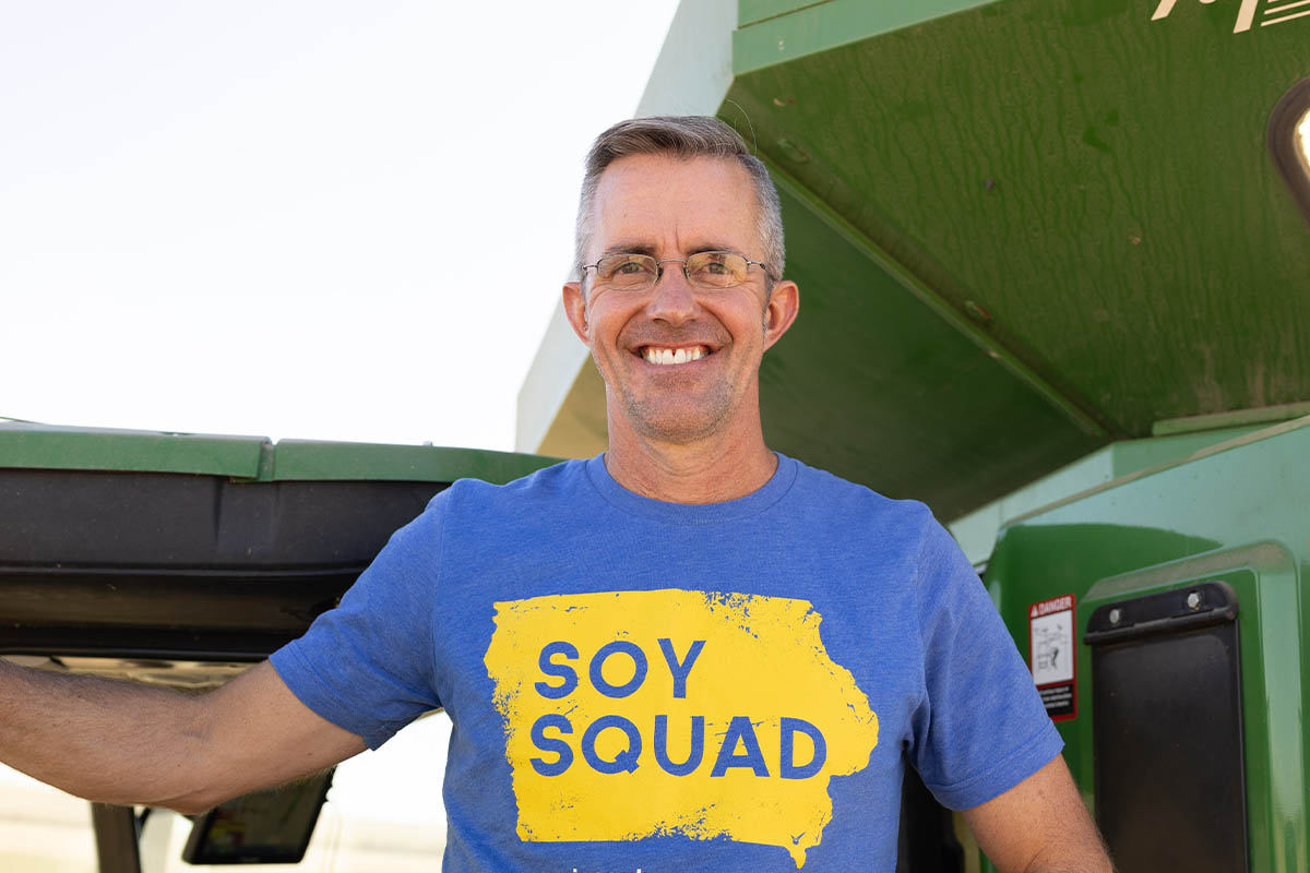 ISA president and farmer near Spencer on combine
