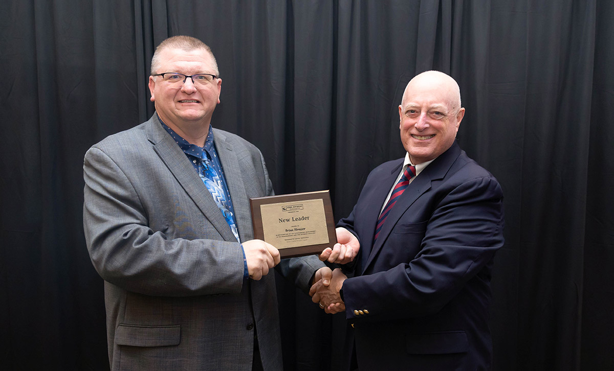 New Leader Award Brian Strasser accepting award.