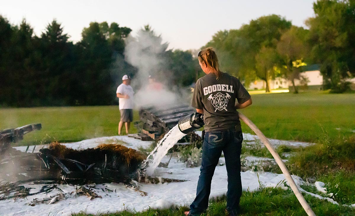 Smoking pallets after firefighter foam was applied.
