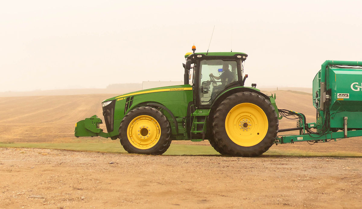 John Deere tractor in field