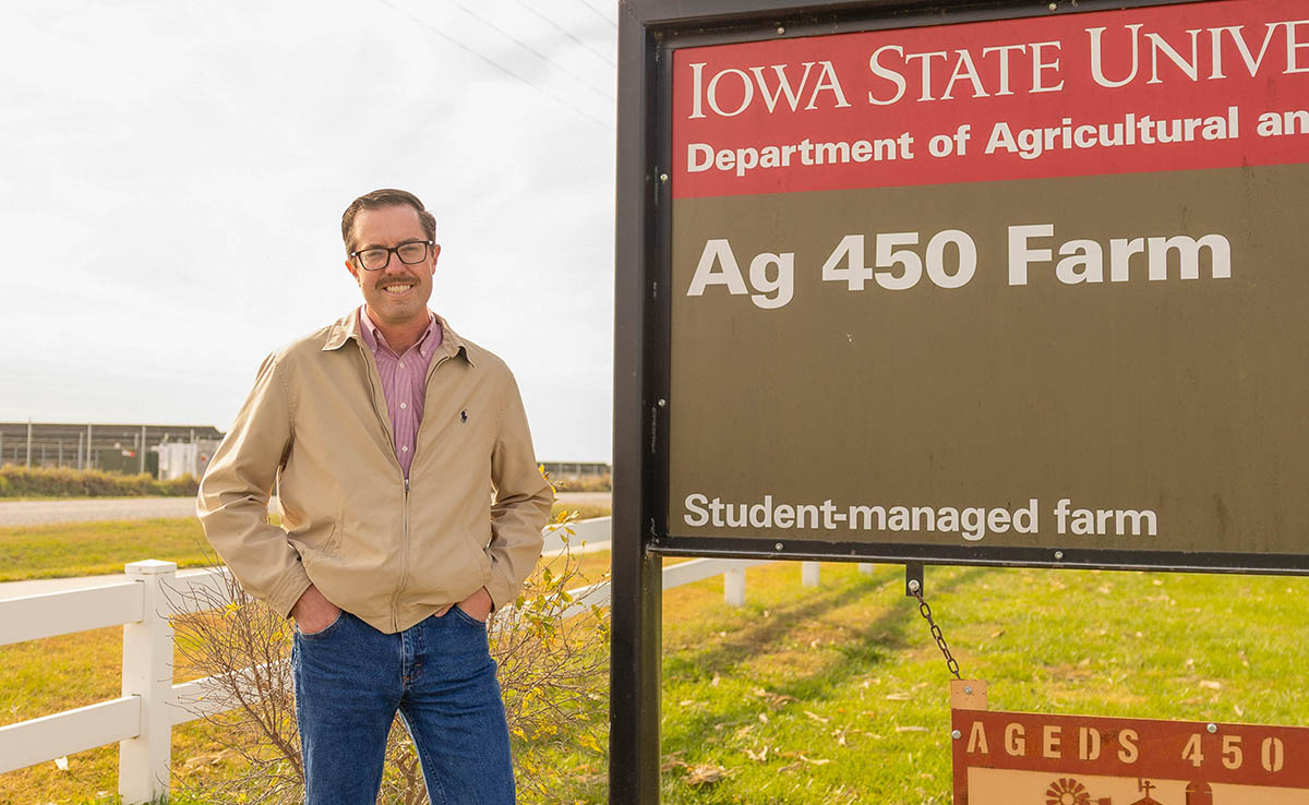 Farmer teaching at student-managed farm