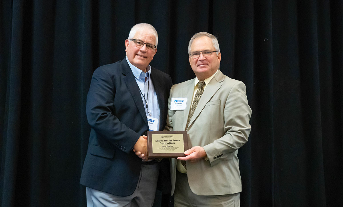 Radio broadcaster accepting award