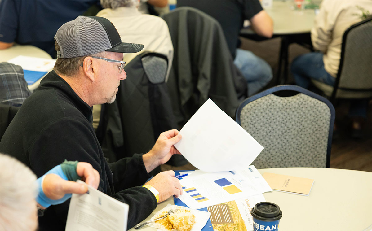 Comparing Conservation Farmer reviewing data