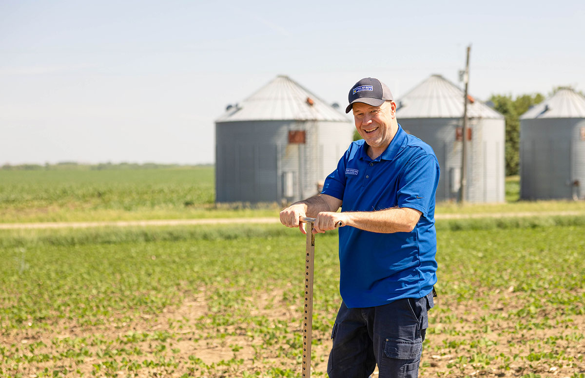 Mike Gilman in Iowa soybean field