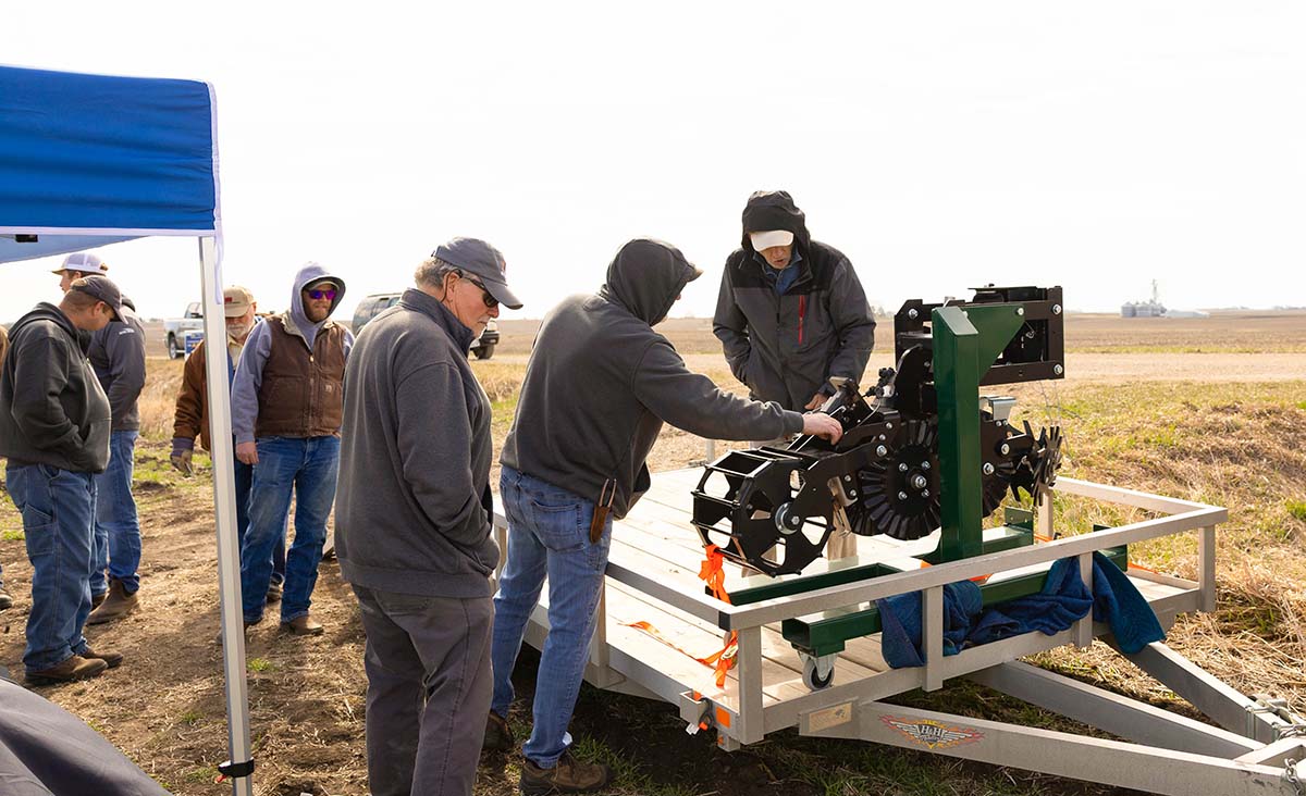 Conservation in Action Tour Farmers checking out field equipment