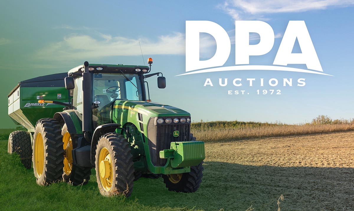 Tractor hooked to grain cart