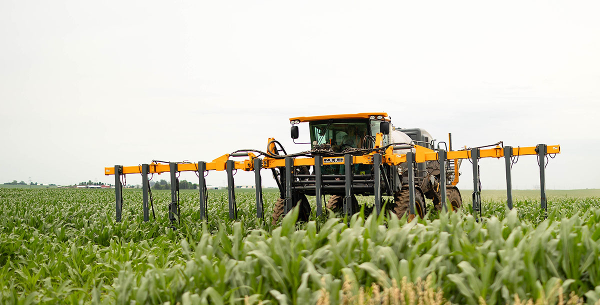 Hagie machinery in corn field