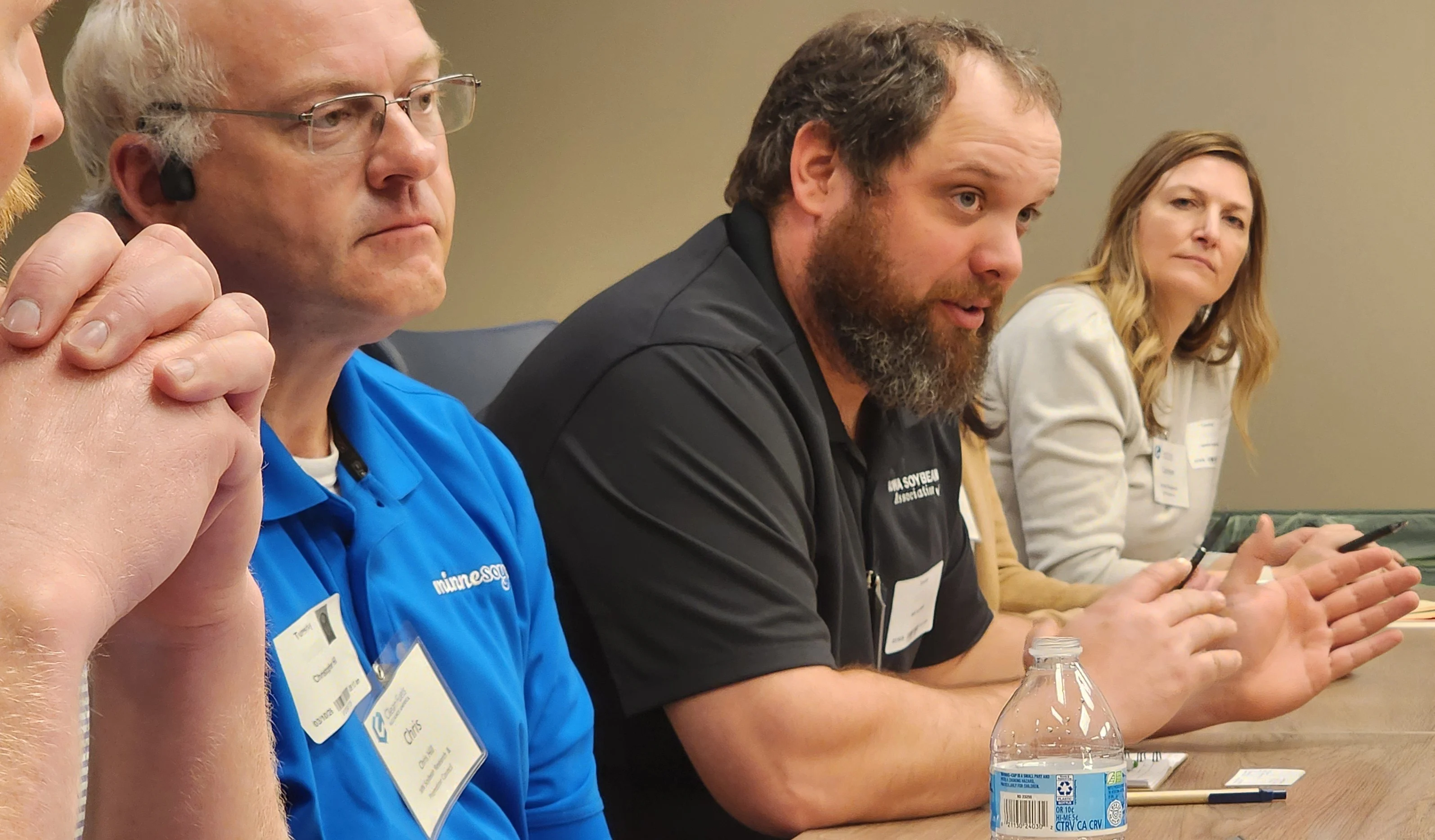 Neil Krummen Speaks From Behind Table