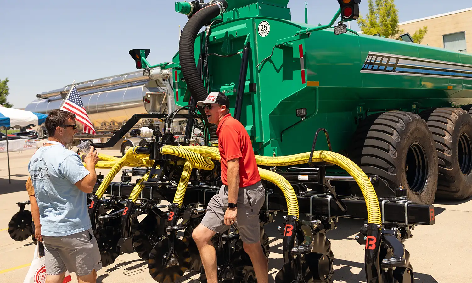 People chat near a manure tank