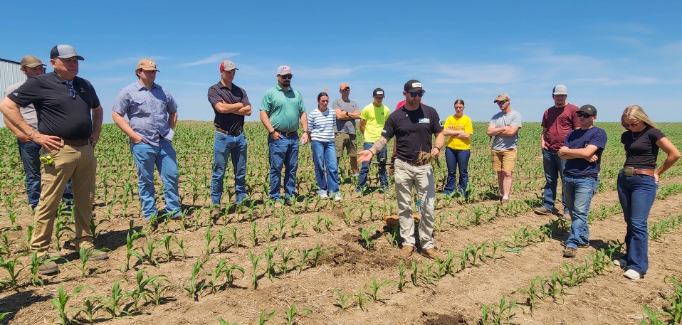 Field day looking at yield limiters People gathered around Cody Goins in field