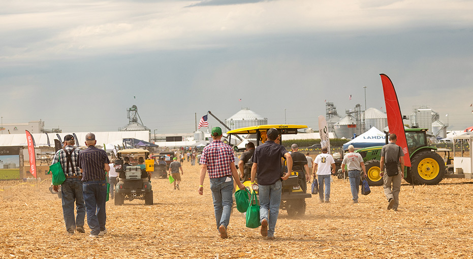 Farmers walking at the Farm Progress Show