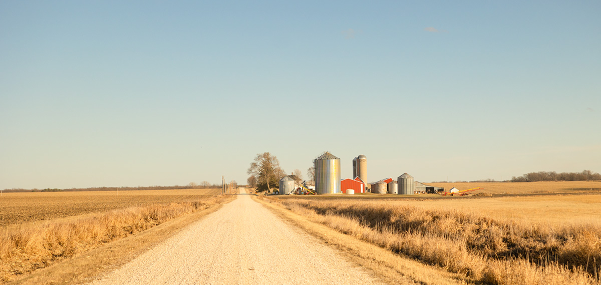 A Red Barn Down a Rural Road