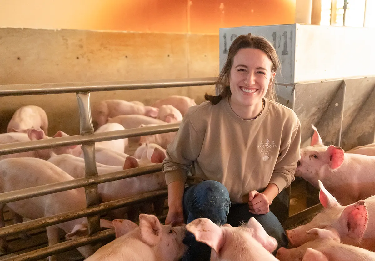 Amanda Tupper in a Hog Barn