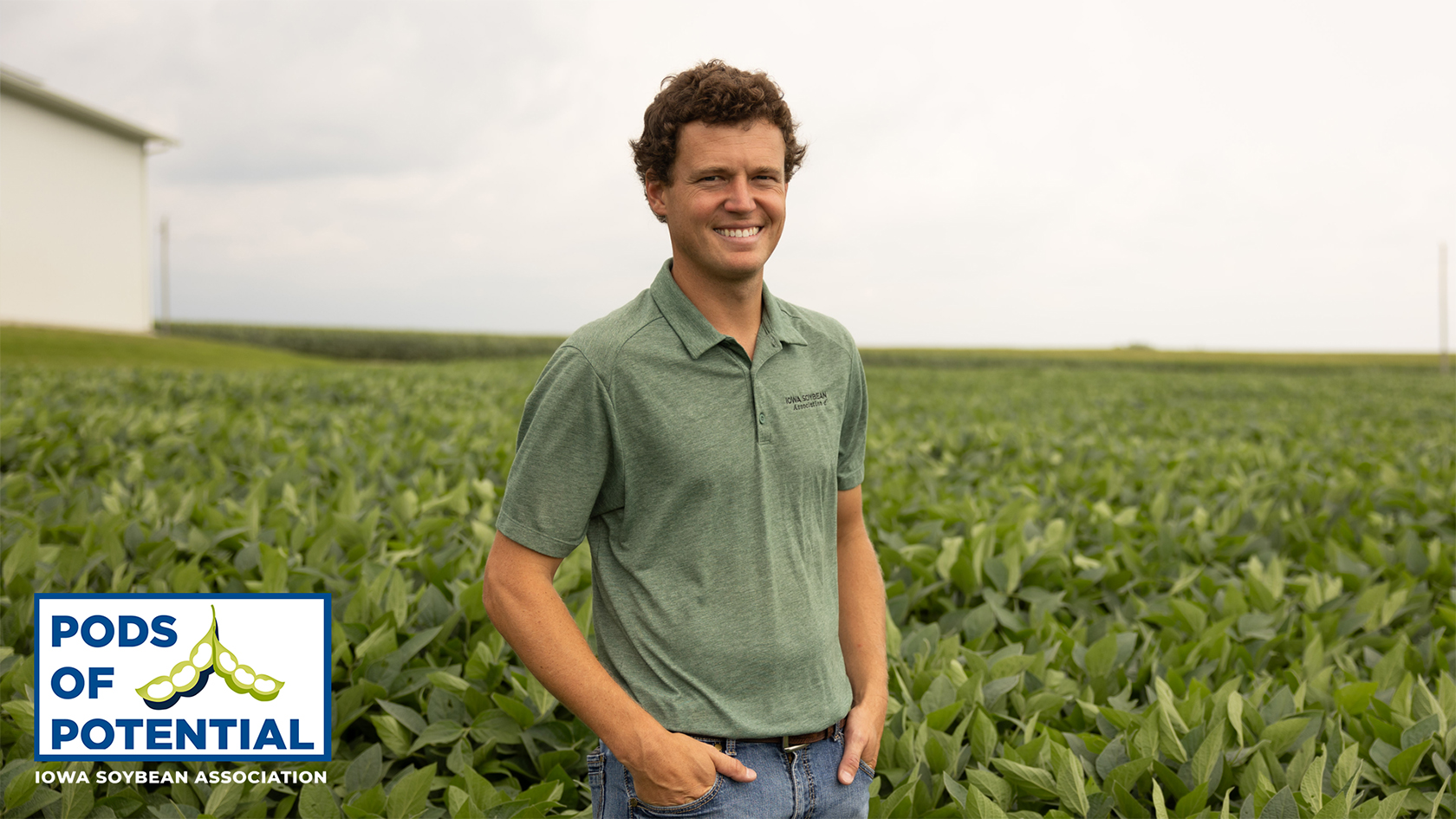 Conservation agronomist stands in soybean field