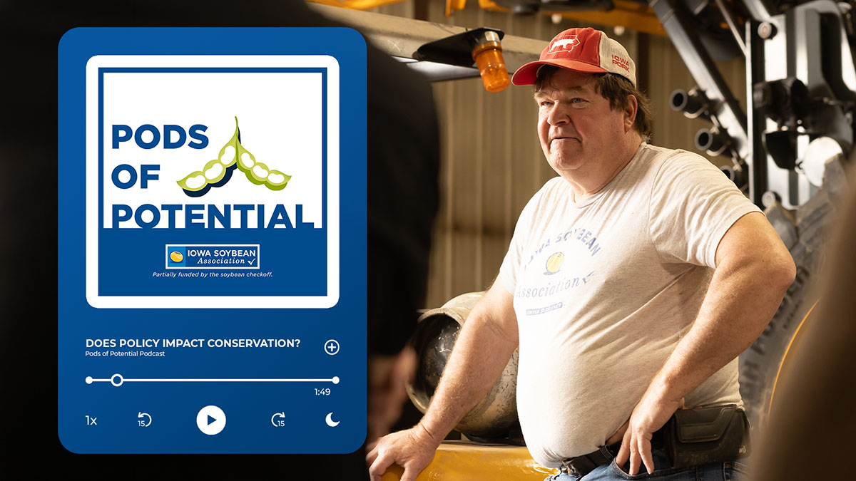 Farming leaning on ag equipment in Iowa