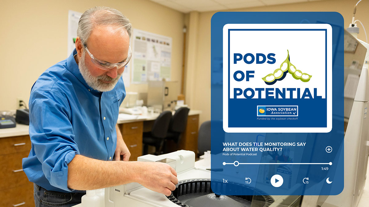 Tony Seeman places water samples in a measuring device