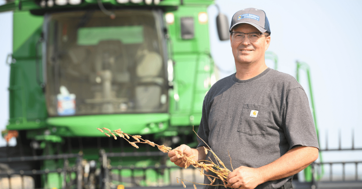 ISA President Jeff Jorgenson in front of his combine