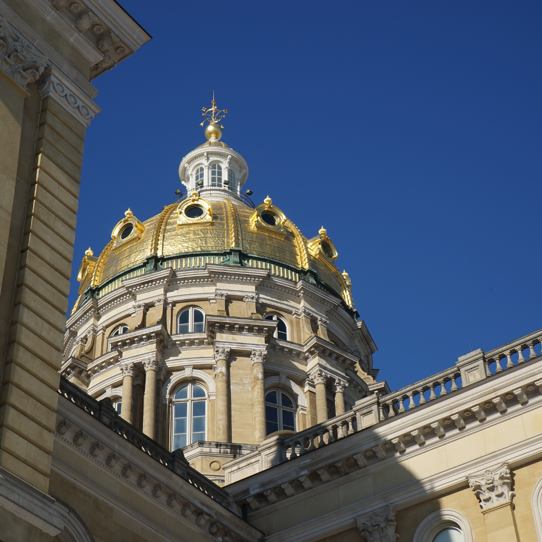 The golden dome of the Iowa State Capitol building shim