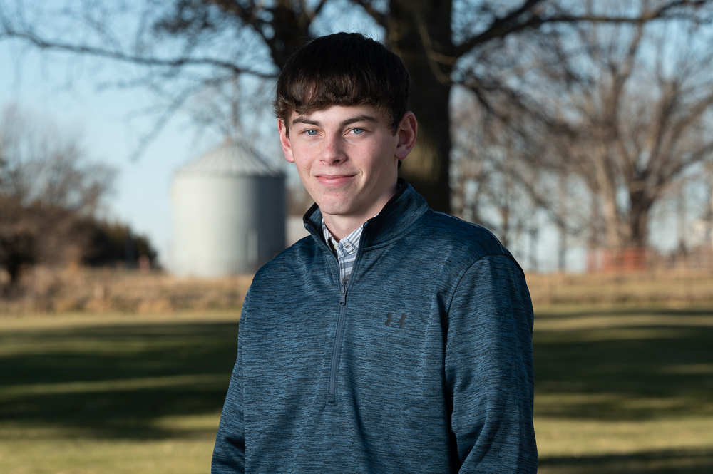 Kollyn Lentz poses for an image at his farm