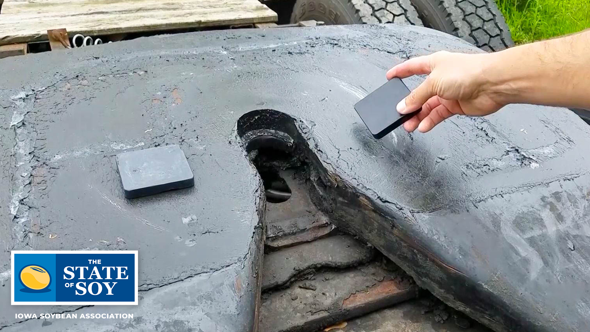 Soy grease pad being applied to truck