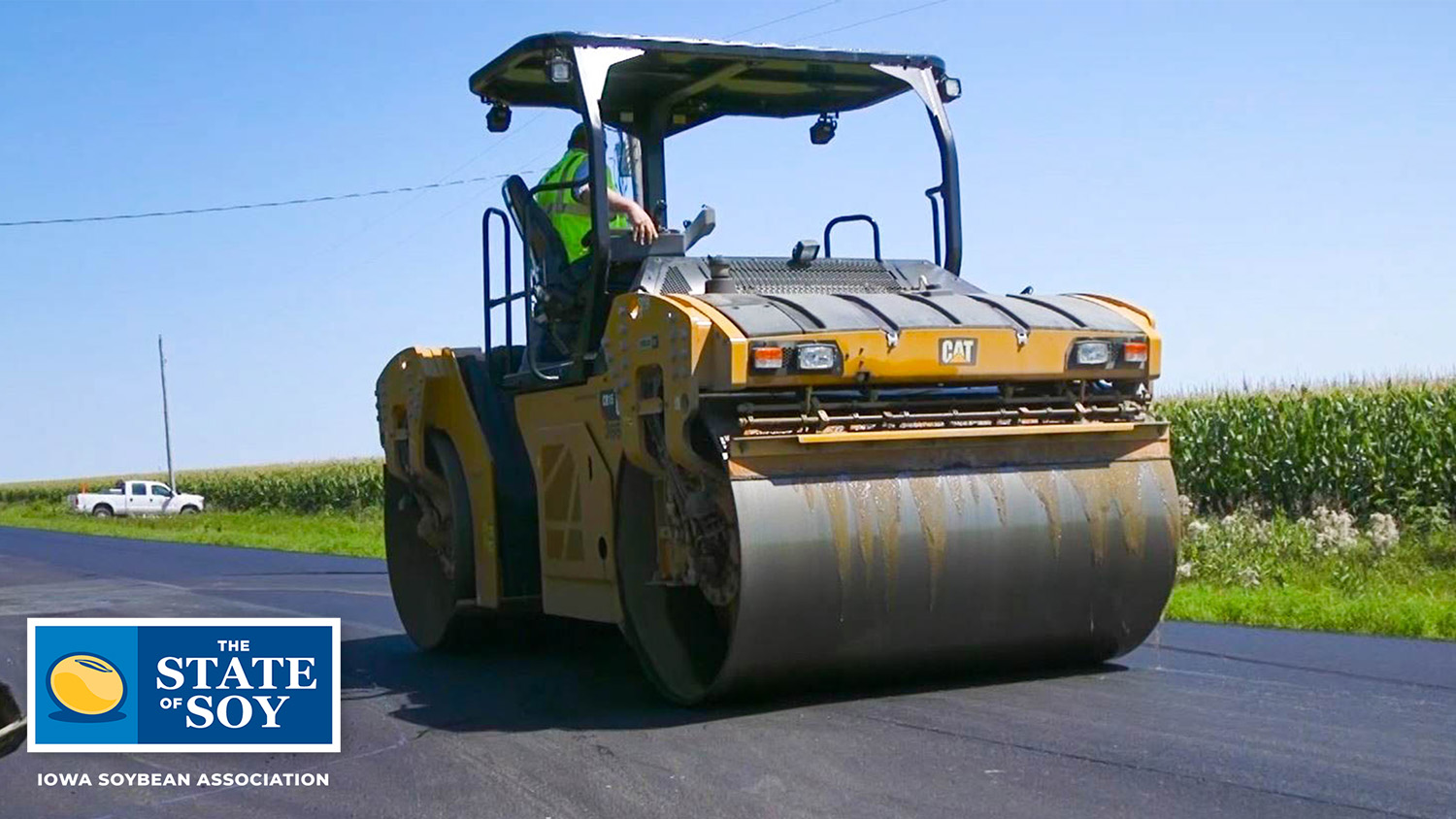 Road roller driving on soybean based asphalt